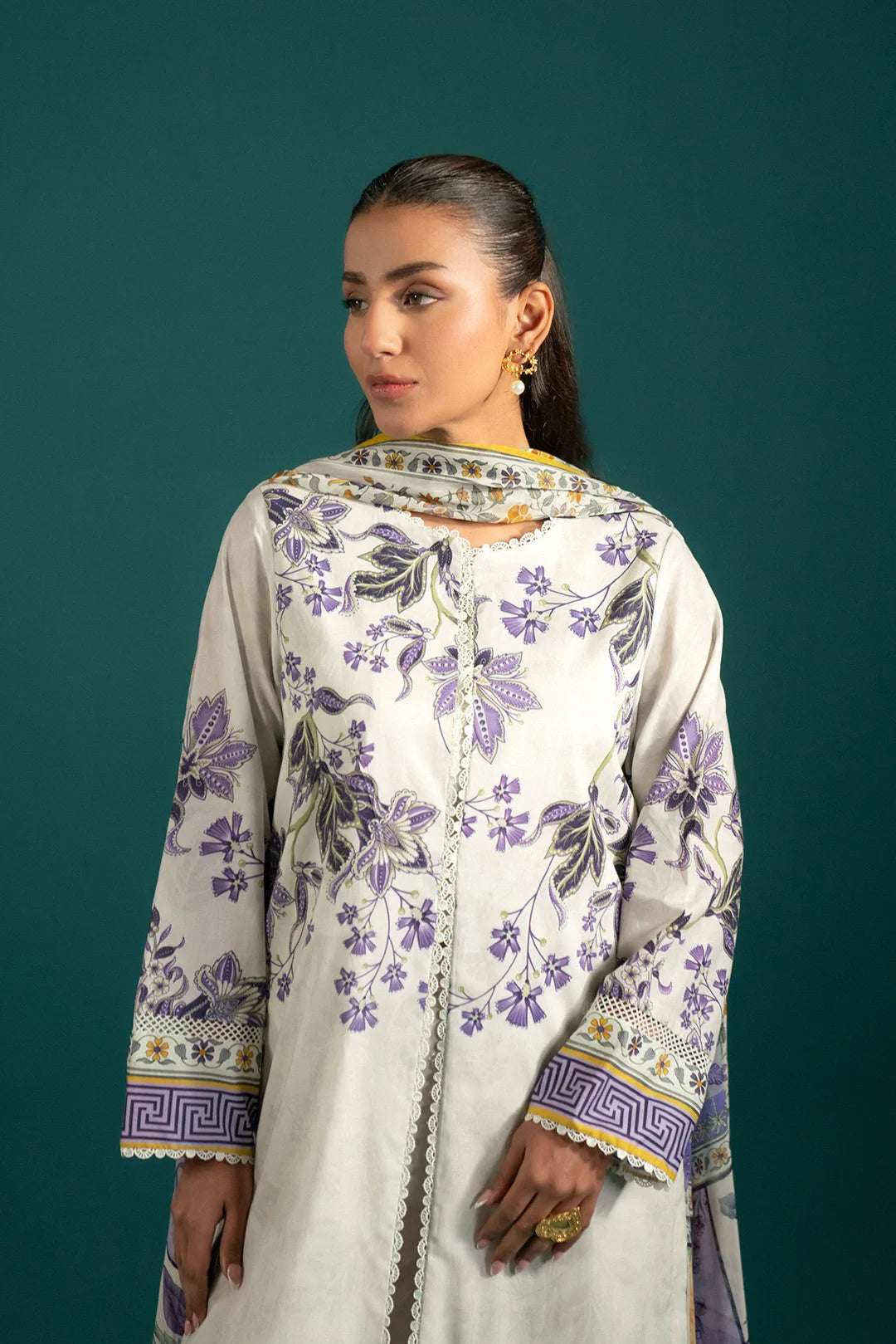 Trendy 3 piece lawn suit in Pakistan – digitally printed lawn shirt with intricate floral motifs, cambric trousers, and a lightweight chiffon dupatta.