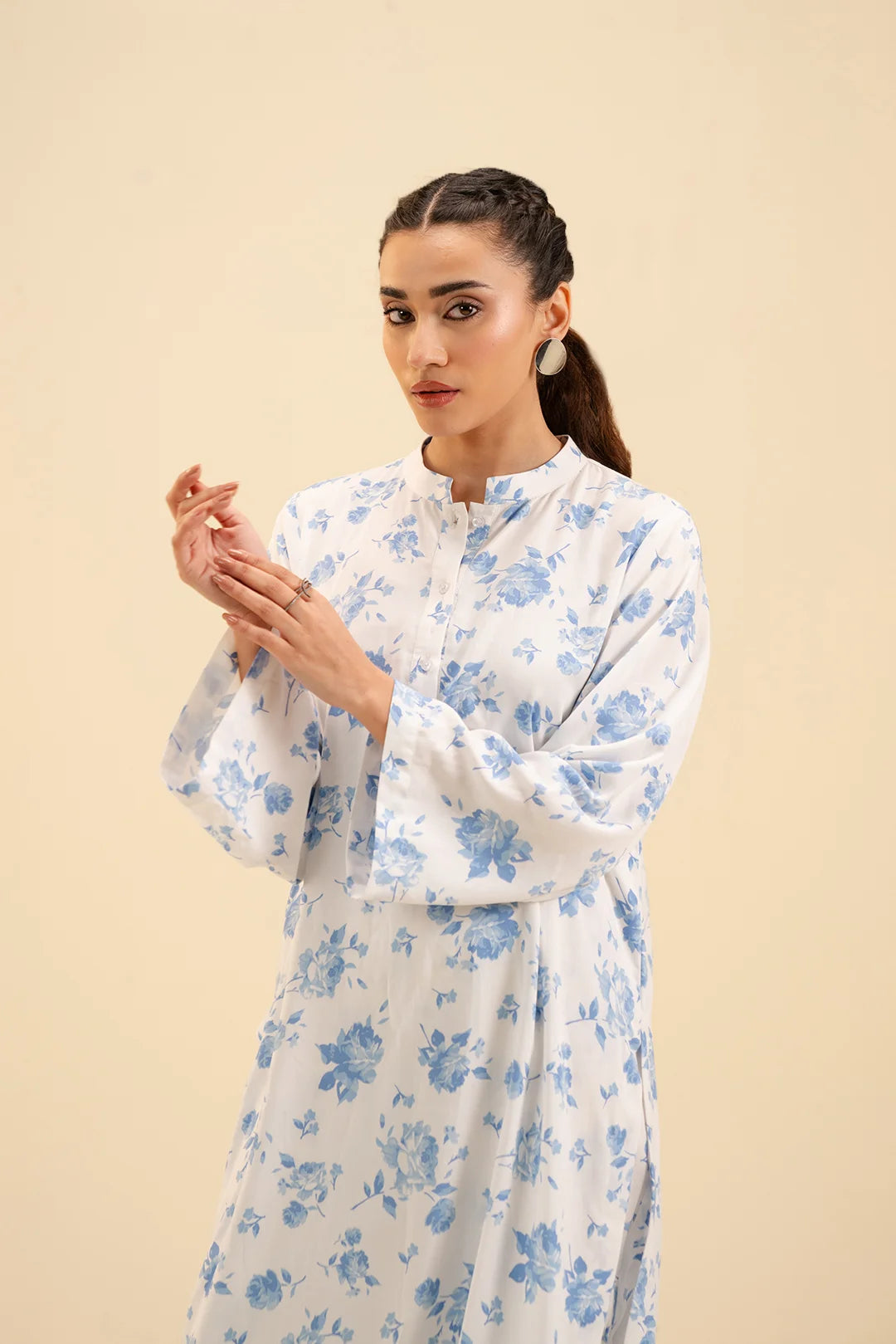 Trendy Pakistani viscose suit 2025 – chic blue and white printed shirt with matching trousers.