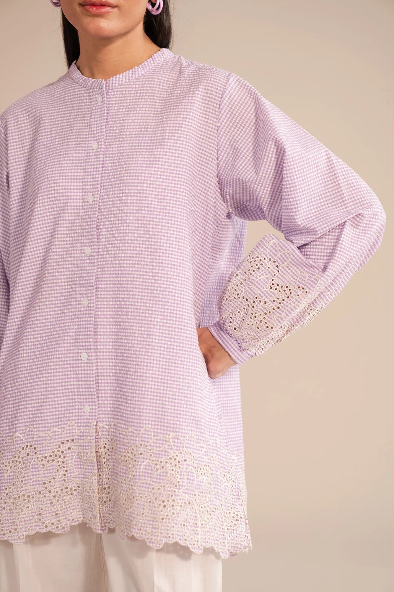 Trendy casual shirt for women featuring embroidery on sleeves and hemline