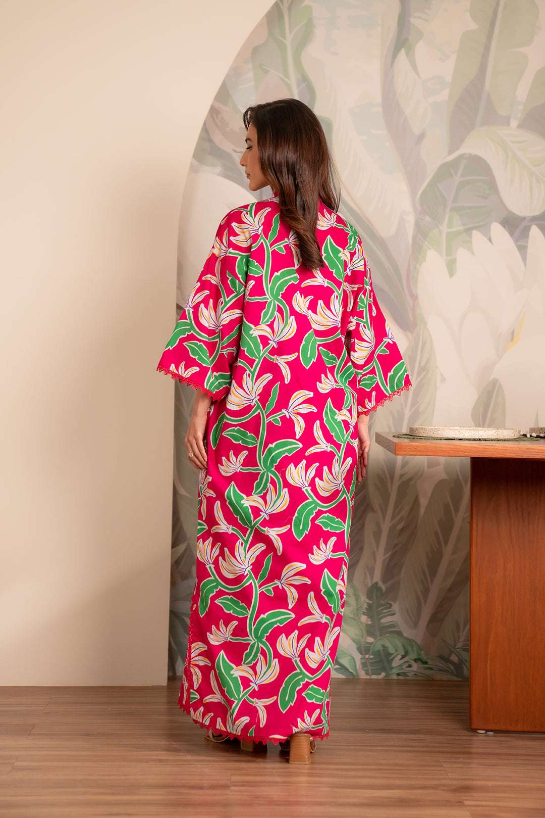 Trendy digital print linen kurti – fresh green and white leafy pattern on a bold pink base.