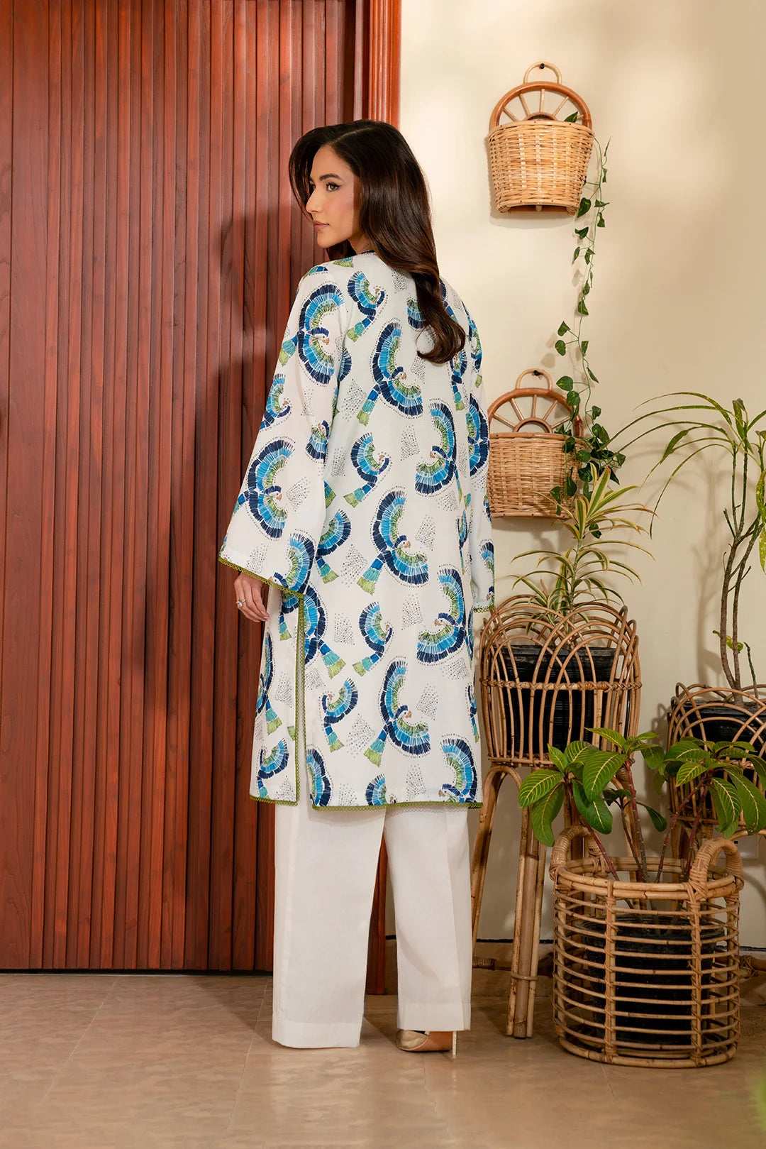 Trendy lawn kurti with vibrant blue patterns - perfect ladies' outfit for casual and semi-formal wear.