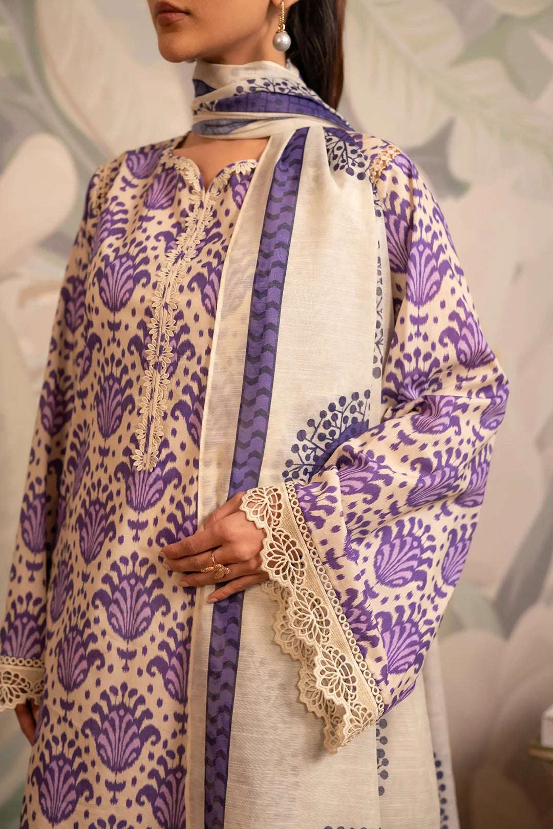 Trendy unstitched lawn suit in Pakistan – a fusion of modern and traditional with an ikkat digital printed shirt and elegant Monark fabric dupatta.