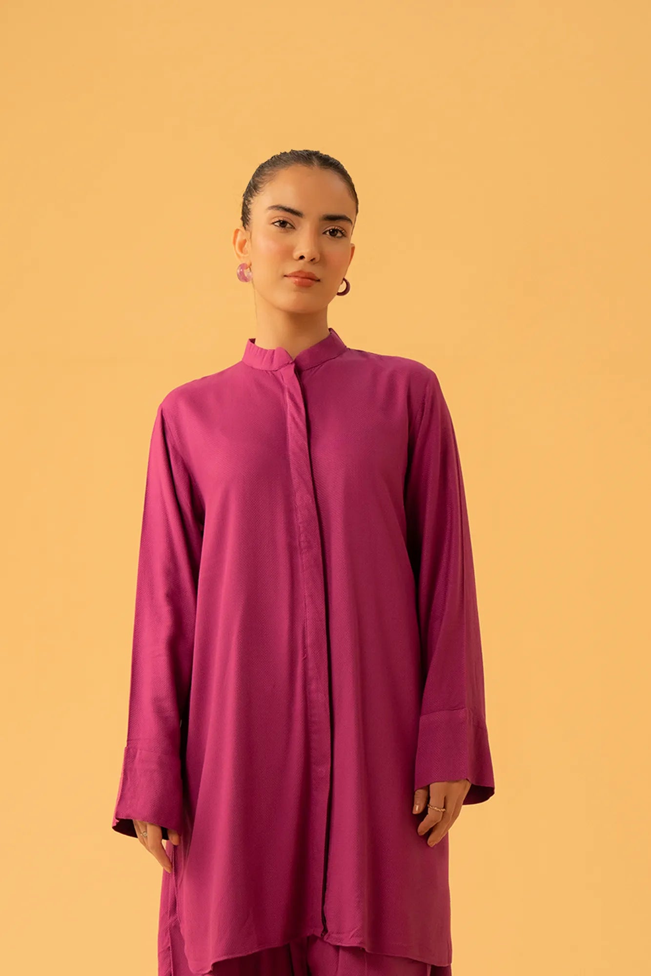 Trendy women’s linen suit in magenta shade from top clothing brand in Pakistan