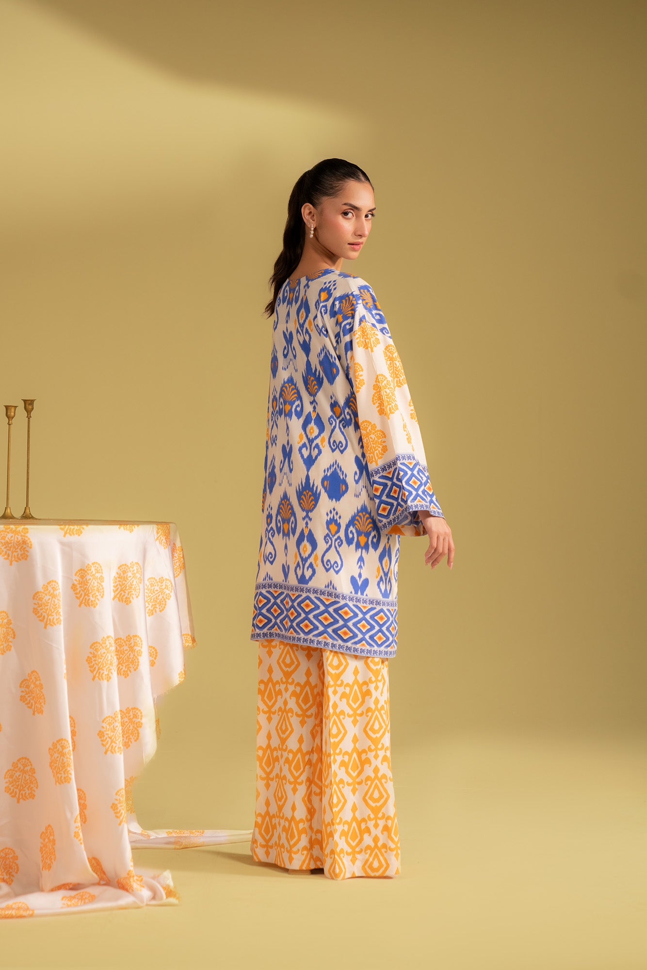 Two-piece unstitched linen suit, new design with printed top and bottom, comfortable and breathable outfit for a casual look in Karachi