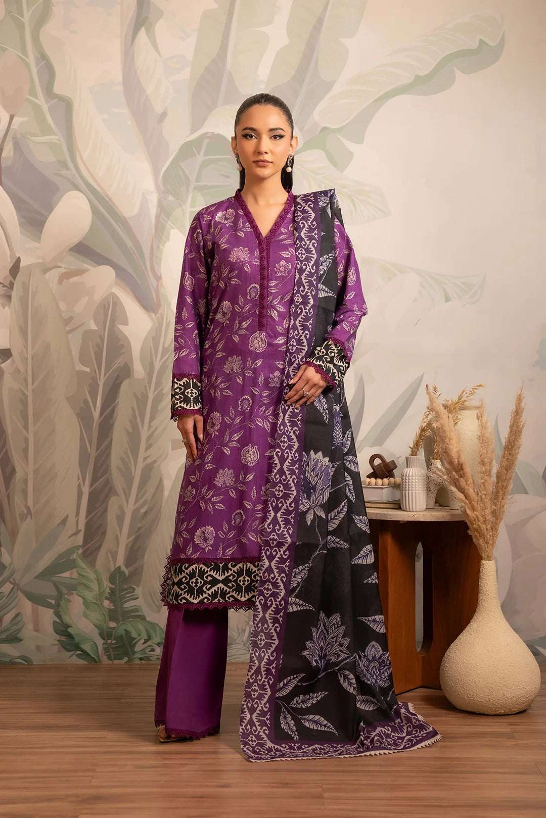 Unstitched printed lawn dress in rich purple, featuring an elegant floral pattern with a contrasting black monark dupatta, perfect for casual summer wear.