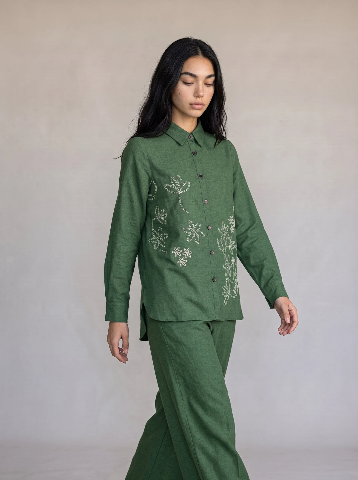  co-ord set with a button-front kurta top and matching wide-leg trousers, styled with brown kolhapuri sandal