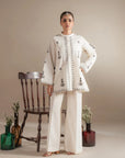 Where to buy elegant white monochrome outfits with black embroidery for Muharram