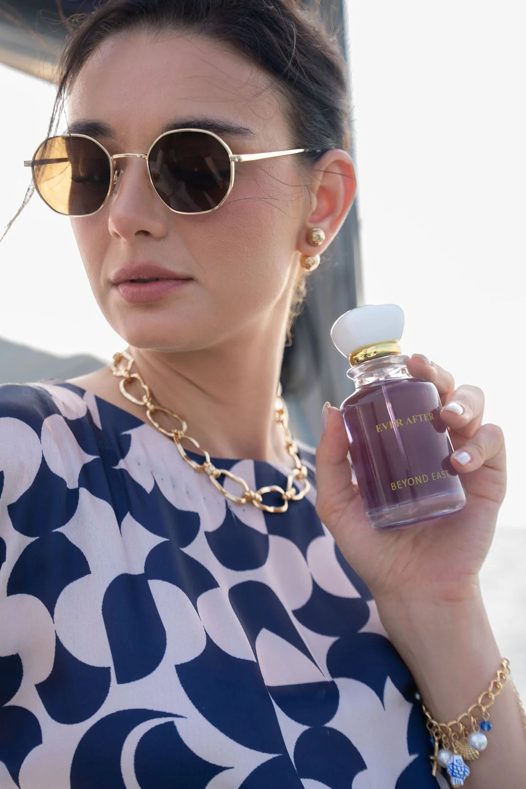 Woman wearing Ever After perfume - Bold floral gourmand fragrance Pakistan