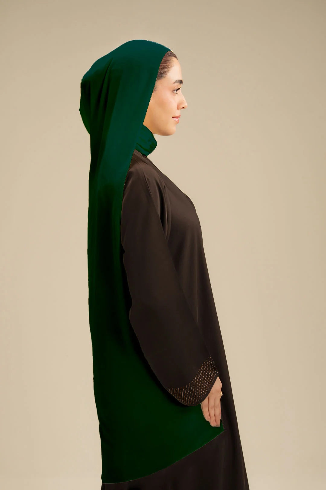 Woman wearing dark green hijab scarf with black abaya – modest wear Pakistan Beyond East WAB161124