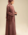 Woman wearing tea pink abaya – colored abaya for women Beyond East Pakistan