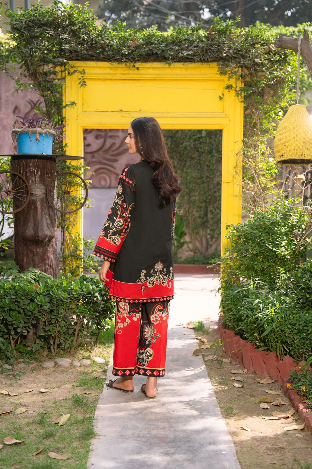 Women’s black and red printed pret suit in cambric fabric