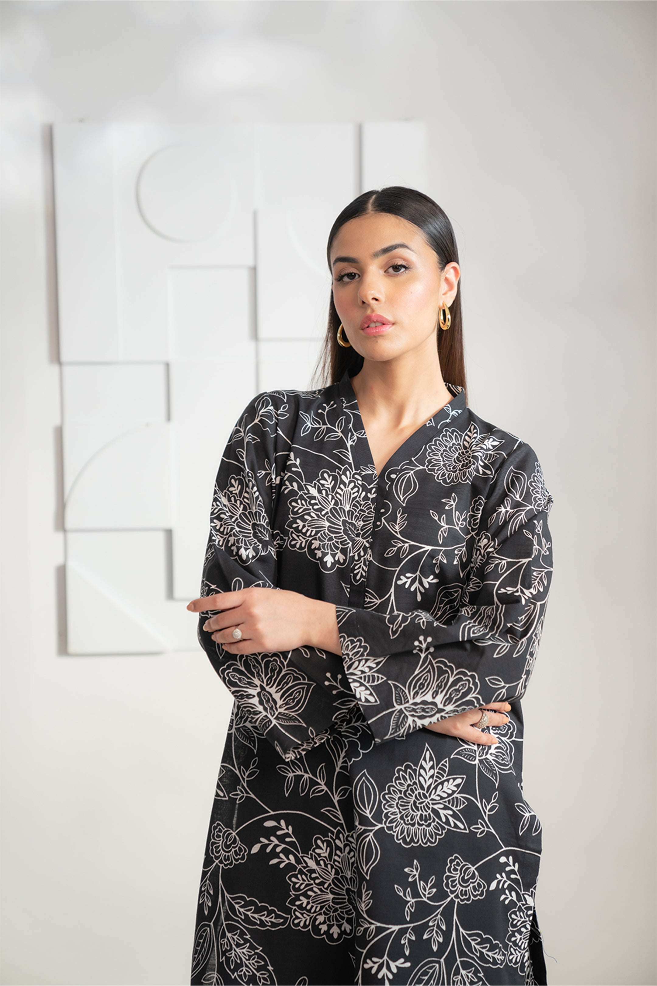 Women’s black and white Karandi shirt with a contemporary silhouette, available to shop online now