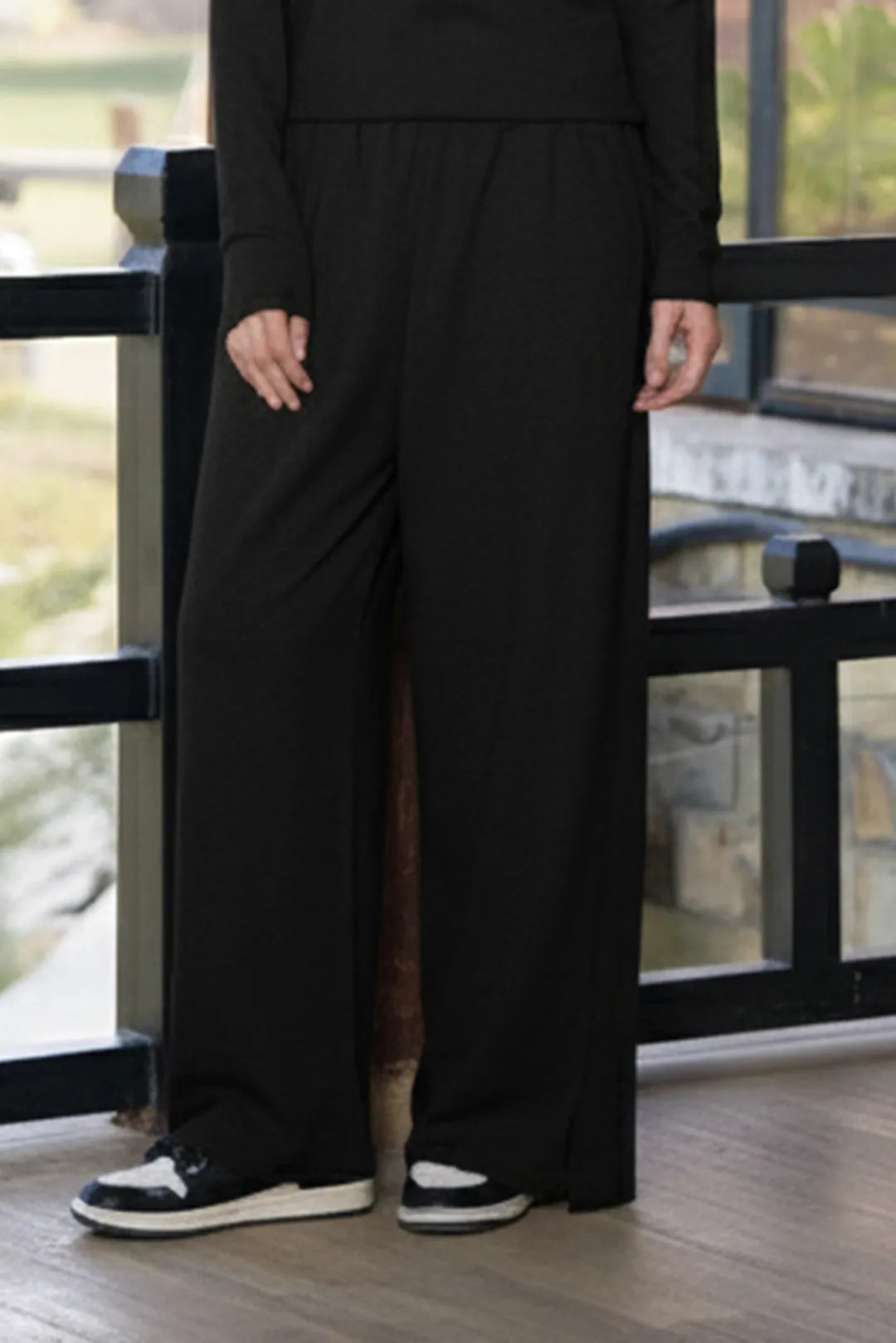 Women’s black cotton-blend trousers with relaxed straight fit