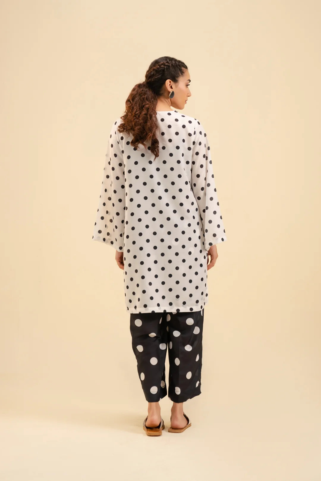 Women’s two piece cambric suit – chic polka dot design in black & white.
