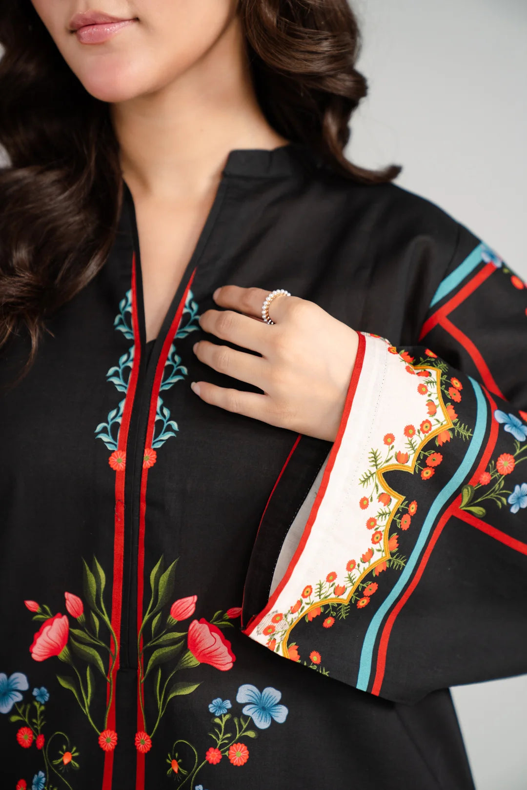 Black printed kurta women detail Pakistan - ethnic multicolor print cambric shirt closeup mother daughter matching outfit