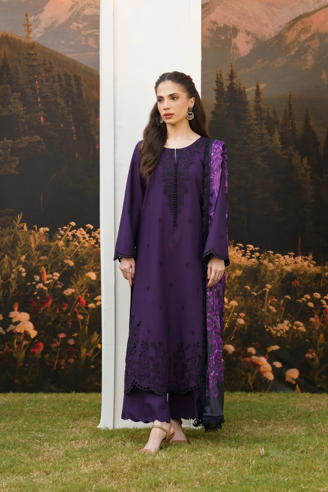 Shop dark purple embroidered linen salwar kameez — unstitched 3-piece suit from the Winter Tale collection. Premium Pakistani linen with rich embroidery. Buy now.