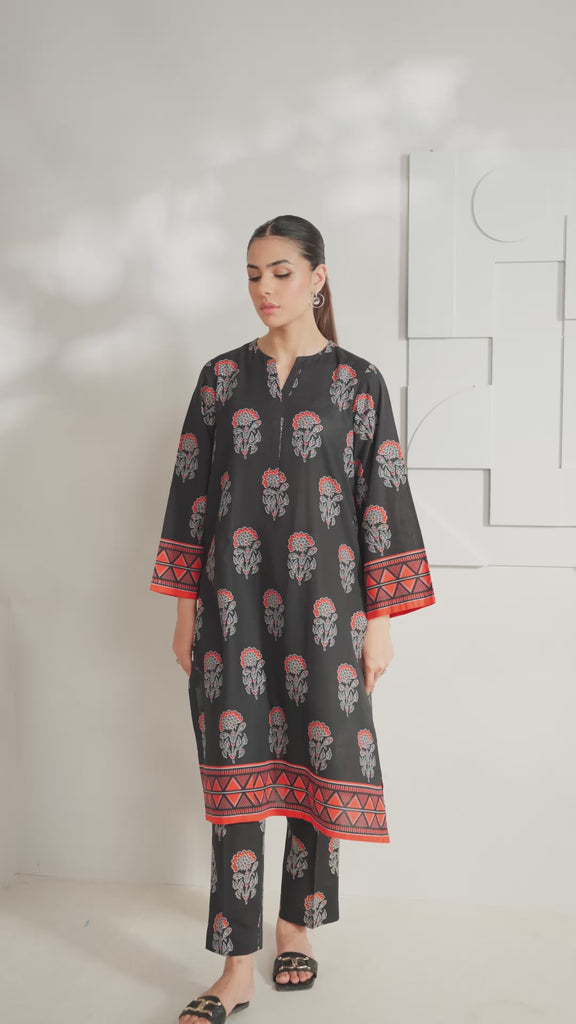 Buy 2-Piece Black Khaddar Suit with Beautiful Prints – Chic & Cozy for Women
