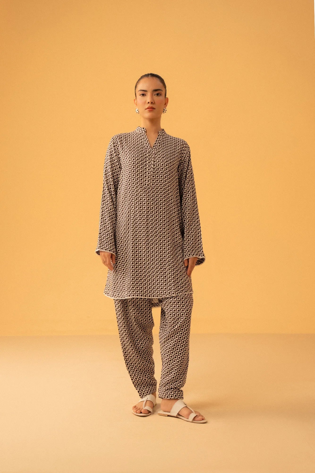 printed suit design for women in heavy georgette with geometric pattern